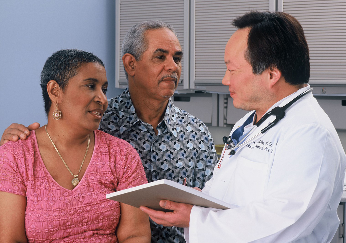 A couple consults with a doctor.