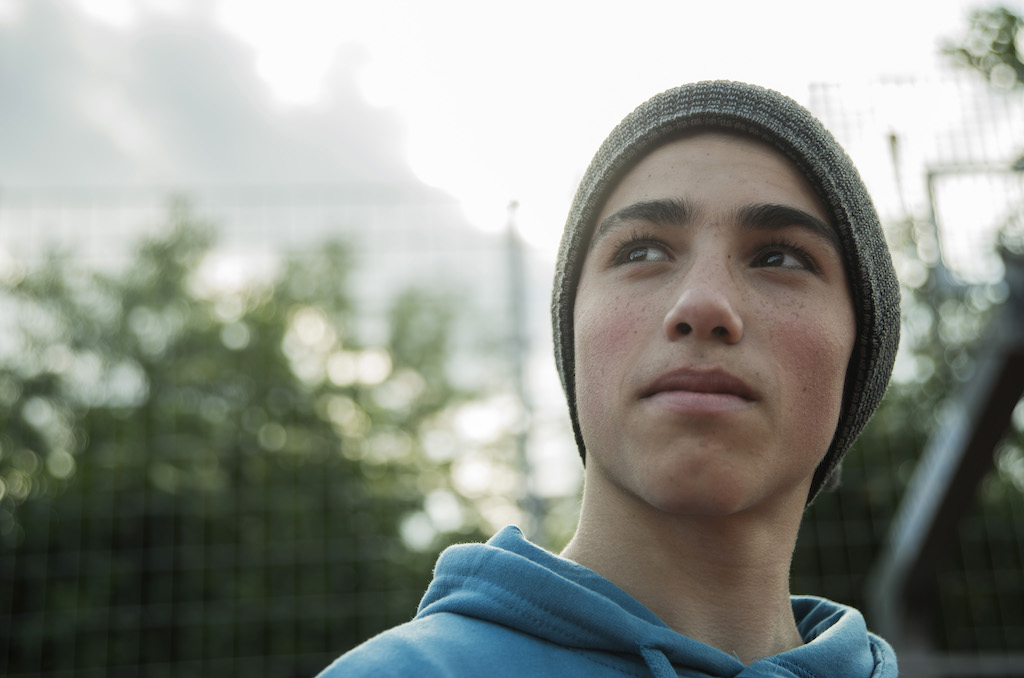 Image of a teenage boy outside