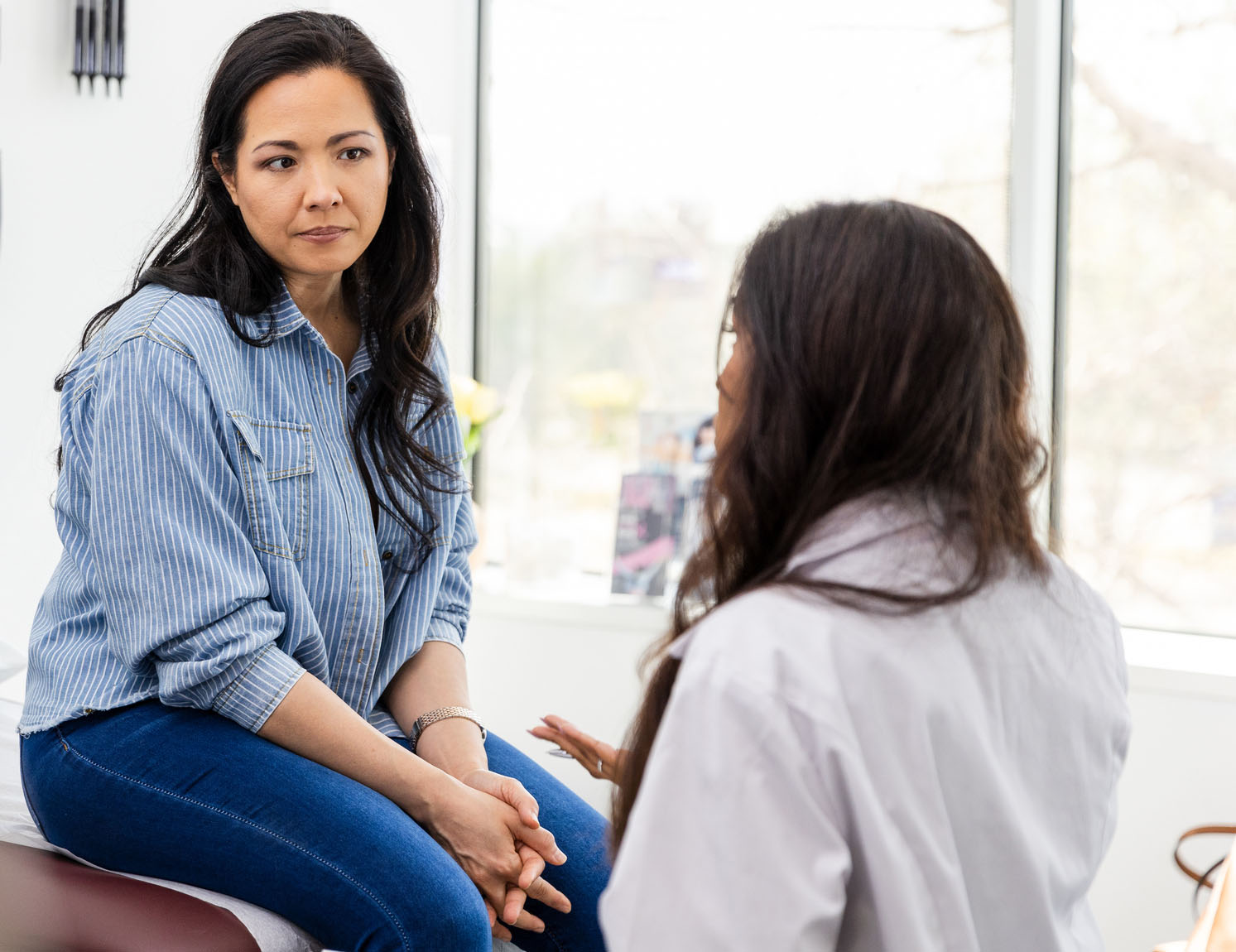 image of a woman speaking with a doctor