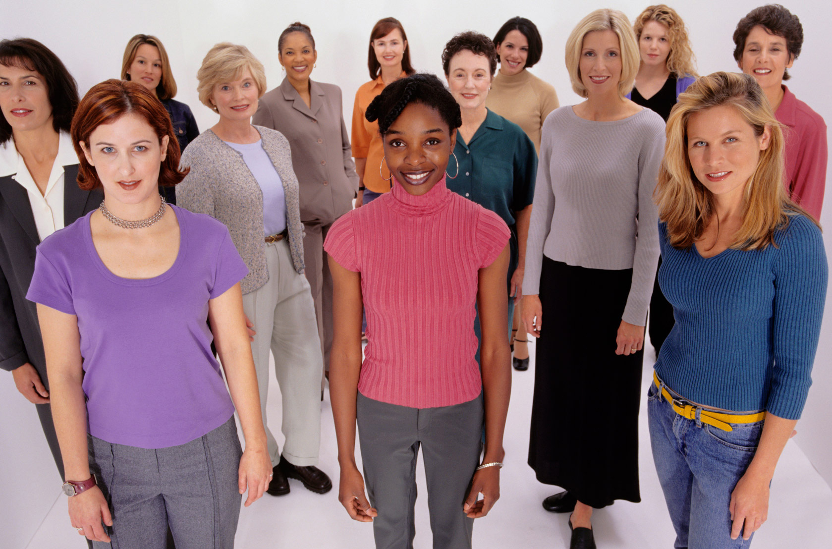 Large group of women standing side by side.