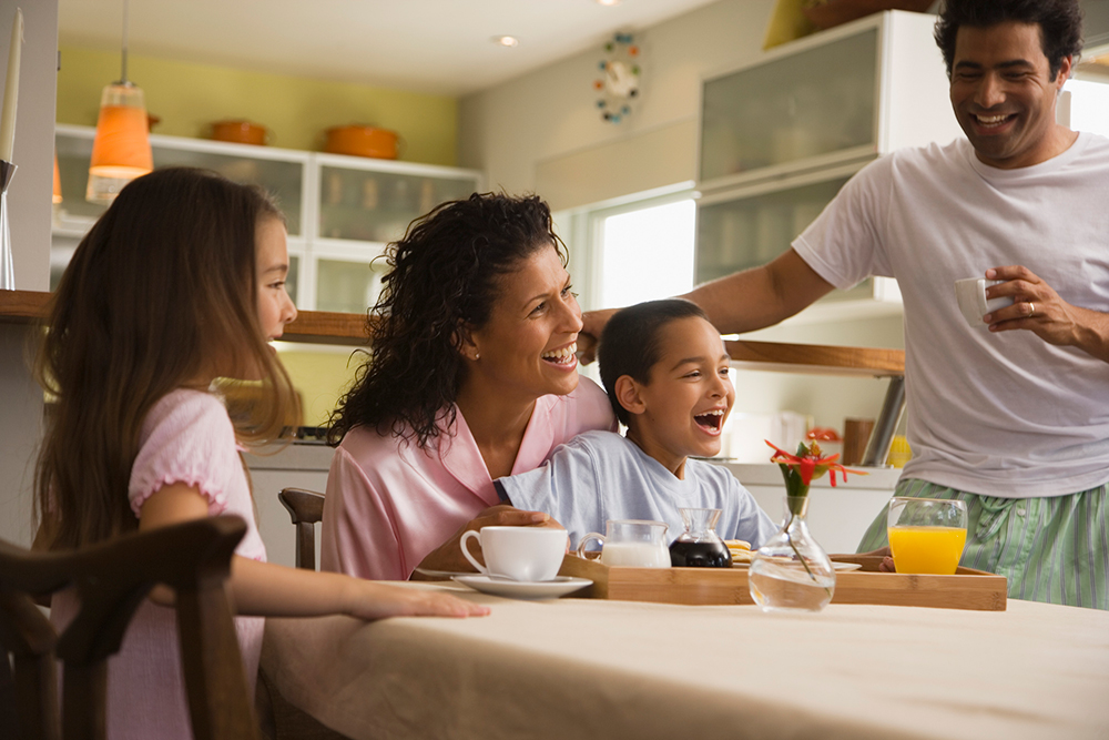 Family enjoying breakfast time together