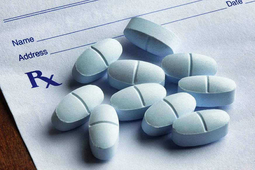 Opioids Hydrocodone with Acetaminophen Tablets on a Prescription Form