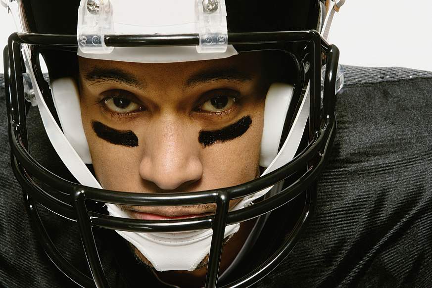 African American man wearing football uniform