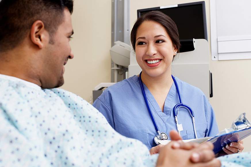 Healthcare worker with a patient Healthcare worker with a patient