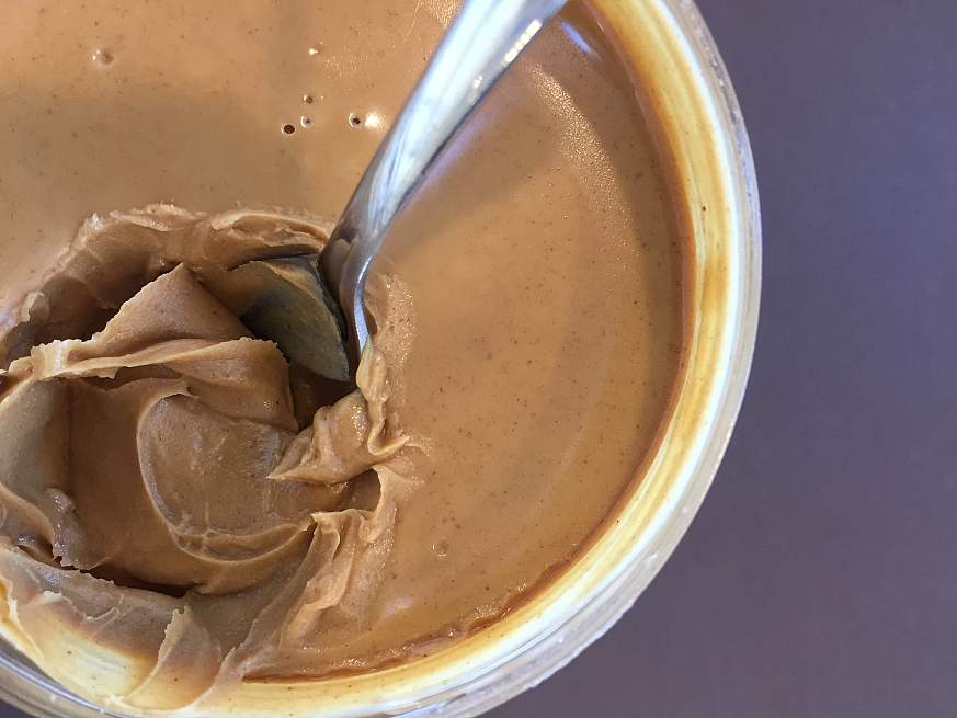 A jar of peanut butter. A jar of peanut butter.