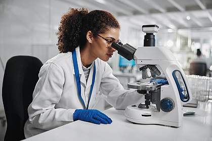 Microscope, woman check and virus research of science study with healthcare, scientist and laboratory work. Analysis, testing and medical professional with investigation for scientific journal Microscope, woman check and virus research of science study with healthcare, scientist and laboratory work. Analysis, testing and medical professional with investigation for scientific journal