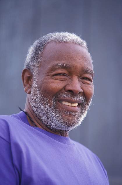 Photo of a man smiling Photo of a man smiling