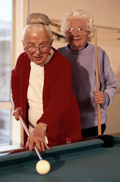 Picture of the 2 older women playing pool