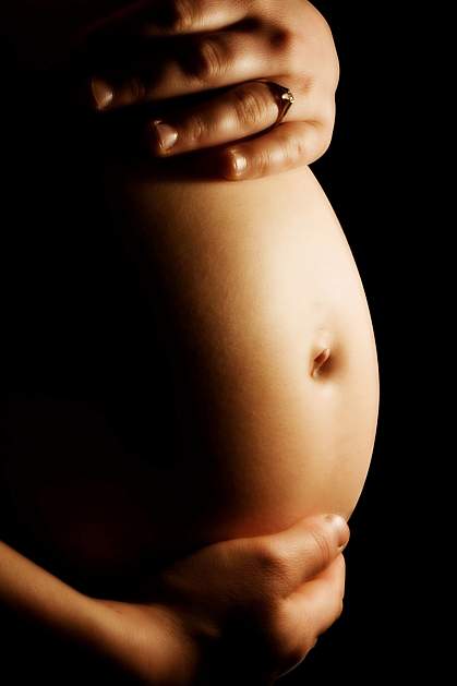 Picture of a pregnant woman's abdomen Picture of a pregnant woman's abdomen