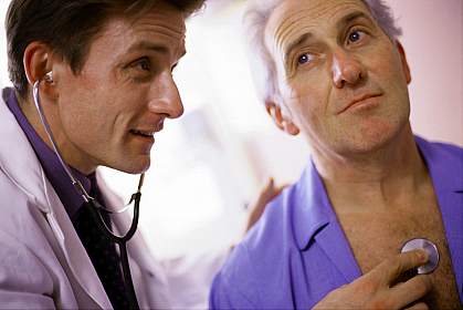 Picture of a doctor with heart patient Picture of a doctor with heart patient