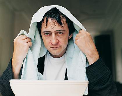 An unhappy man with the flu An unhappy man with the flu