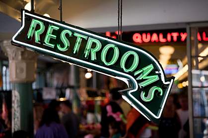 Photo of a restroom sign Photo of a restroom sign
