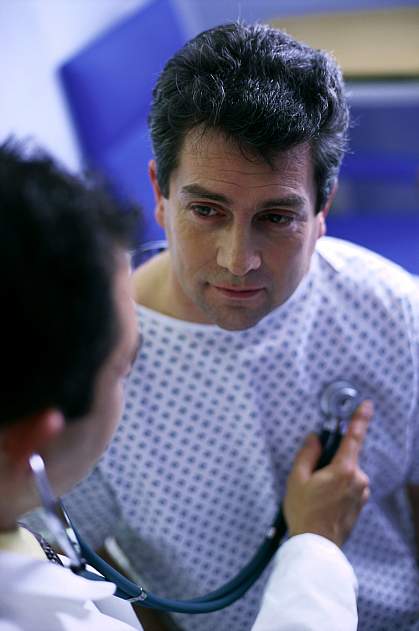 a photo of a man having a consultation with his doctor a photo of a man having a consultation with his doctor