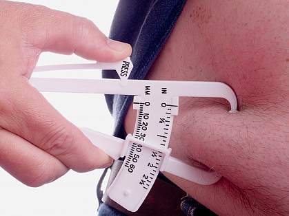 photo of calipers measuring fat photo of calipers measuring fat