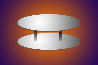 Illustration of two metal discs with spacers separating them Illustration of two metal discs with spacers separating them