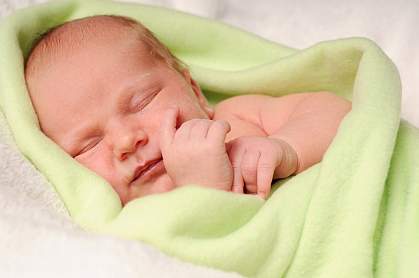 Photo of newborn baby sleeping peacefully Photo of newborn baby sleeping peacefully