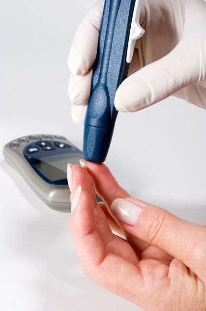 Photo of a finger-prick test for diabetes Photo of a finger-prick test for diabetes