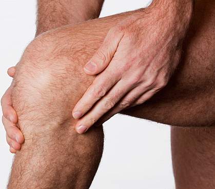 Photo of a man's knee Photo of a man's knee