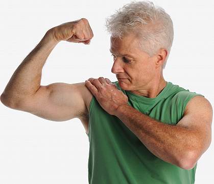 Photo of an older man flexing large biceps Photo of an older man flexing large biceps