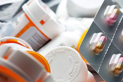 Photo of medicine bottles and capsules Photo of medicine bottles and capsules