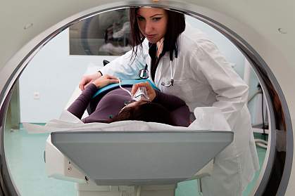 Person in an MRI machine Person in an MRI machine.