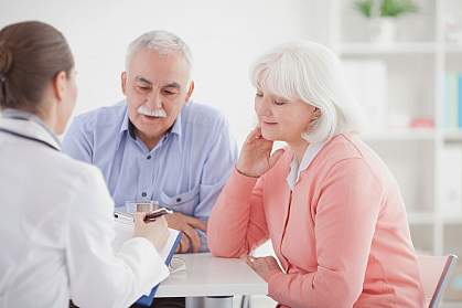 Older couple consulting with a doctor Older couple consulting with a doctor.