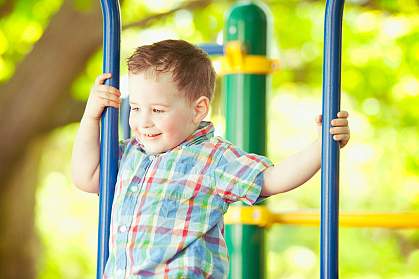 Boy playing at the park.