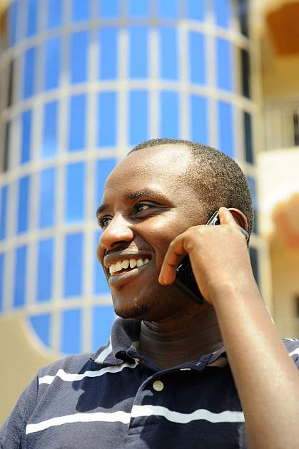 African man using a mobile phone.