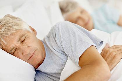 Photo of an elderly couple asleep. Photo of an elderly couple asleep.