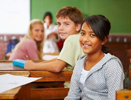 Photo of middle school children in classroom.