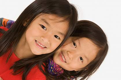 Sisters smiling. Sisters smiling.