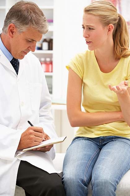 Doctor with female patient Doctor with female patient.