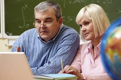 Senior couple studying together Senior couple studying together.