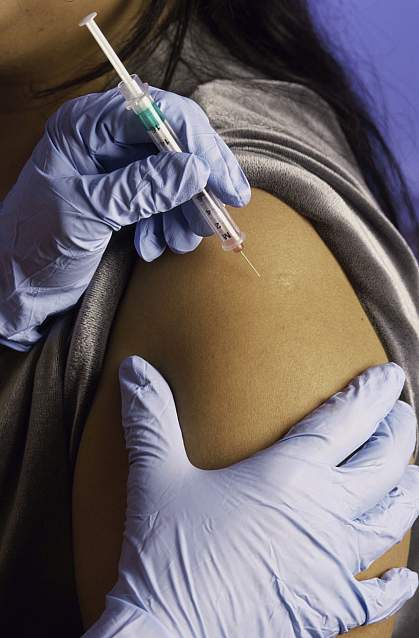 Person getting an injection Person getting an injection.