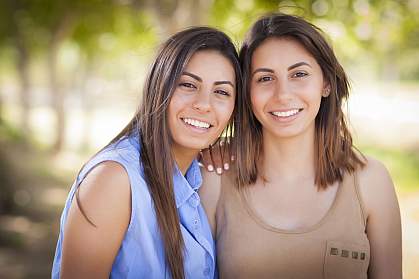 Portrait of mixed race twin sisters Portrait of mixed race twin sisters.