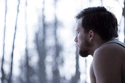 Man looking out a window. Man looking out a window.