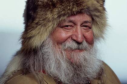 Portrait of a senior Inuit man smiling. Portrait of a senior Inuit man smiling.