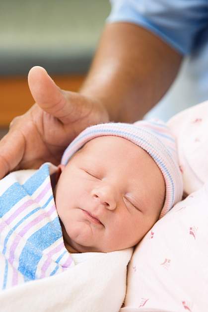 Newborn wrapped in blanket Newborn wrapped in blanket.