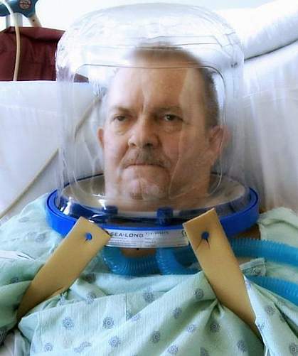 Helmet-based ventilation eases respiratory distress Man in ventilation helmet