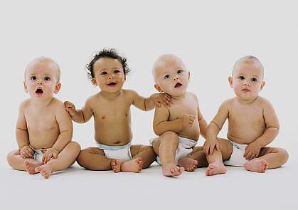Group of infants sitting in their diapers Group of infants sitting in their diapers