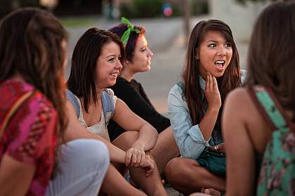 Teens talking outdoors Teens talking outdoors