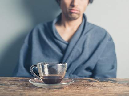 Tired man drinking coffee Tired man drinking coffee