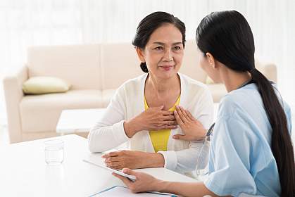 Older woman and doctor discussing heart diseases Older woman and doctor discussing heart diseases