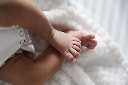 Feet of infant girl. Feet of infant girl.