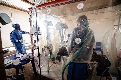 Health workers caring for a patient suspected of having Ebola Health workers caring for a patient suspected of having Ebola