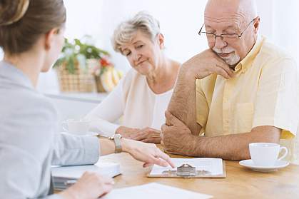 Senior couple making a decision with an advisor Senior couple making a decision with an advisor