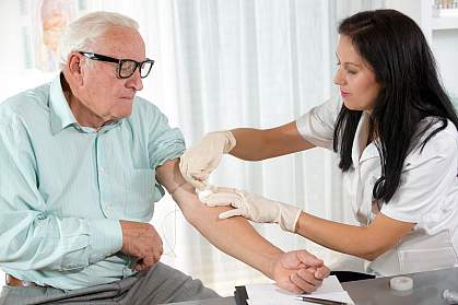 Older man getting blood drawn Older man getting blood drawn