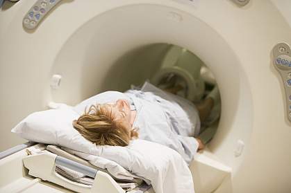 Patient undergoing CAT scan of the abdomen Patient undergoing CAT scan of the abdomen