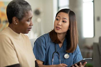 Doctor speaking with elderly patient Doctor speaking with elderly patient