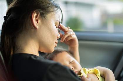Stressed mom trying to nap with baby in car Stressed mom trying to nap with baby in car